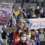 Activists stage global climate protest, slam Ukraine war.