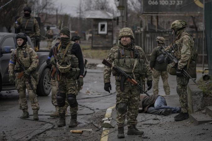 Ukrainian forces retake areas near Kyiv amid fear of traps.