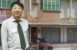 YU KUAN CHON shown at the office where he sent RM 1 Billion in Deposits in Perak Malaysia.