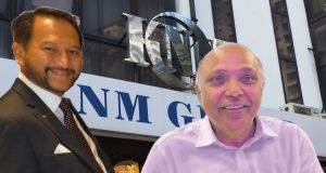 Malaysian High Court Halts KNM Group Restructuring Judge's gavel on a wooden block in a Malaysian courtroom, with legal documents and a company logo in the background.