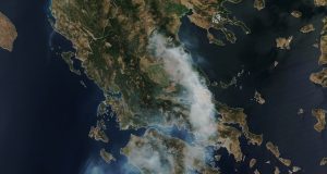 Greece Wildfires Kill 28 as Heatwave Fuels Blazes Firefighters battling a large wildfire on the Greek island of Rhodes as flames approach seaside resorts