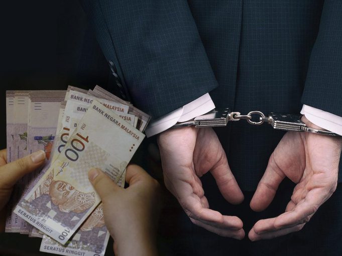 A gavel and legal documents on a desk symbolize corporate crime and scandal in Malaysia's 1MDB case.