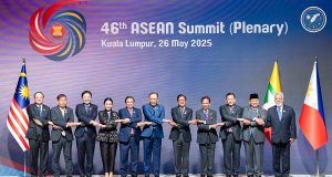 Malaysia Hosts 46th ASEAN Summit in Kuala Lumpur Malaysian officials welcome ASEAN leaders beneath flags at Kuala Lumpur convention centre on 26 May 2025.