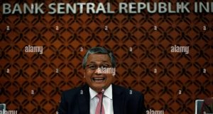 Indonesian bank trims rates to head off coronavirus impact Bank Indonesia Governor Perry Warjiyo