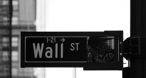 Barclays Fined £290M for Libor Manipulation Close-up of a trading screen showing the Libor rate with a red downward arrow overlay, symbolizing benchmark manipulation.