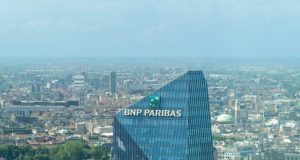 BNP Paribas Pleads Guilty to Sanctions Violations BNP Paribas bank building exterior in Paris, France, with the company logo displayed above the entrance.