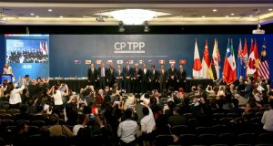 Chile Joins CPTPP, Boosts Malaysia Trade Chilean and Malaysian flags flank a document titled CPTPP, symbolizing the new trade partnership.