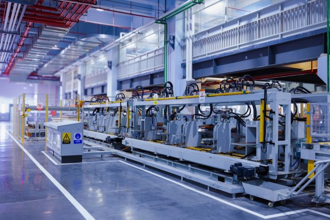 SEMI Forecasts Record US$108.5 Billion in Chip Equipment Sales, Then Decline A technician inspects a wafer etching machine in a cleanroom semiconductor fab facility.