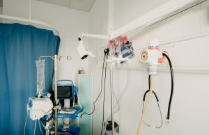 Healthcare workers in protective gear treat a patient in a Rwandan ICU during the Marburg virus outbreak