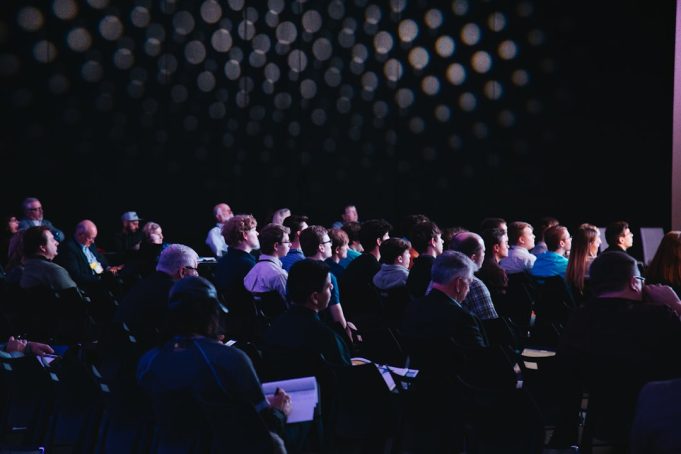 COP29 Finalizes UN-Backed Carbon Credit Registry for Emissions Trading Delegates at COP29 in Baku Olympic Stadium review documents on carbon credit trading rules.