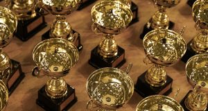 Kendrick Lamar Wins 5 Grammys, Tops Jay-Z Record Kendrick Lamar holds a Grammy award on stage at the Crypto.com Arena during the 68th Grammy ceremony.