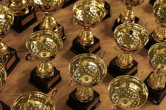 Kendrick Lamar Wins Five Grammys; Recording Academy Moves to Disney in 2027 Kendrick Lamar holds a Grammy award on stage at the Crypto.com Arena during the 68th Grammy ceremony.