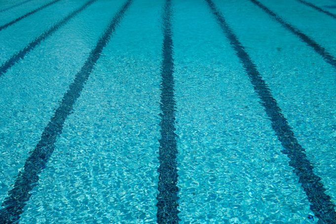Paralympic swimming concludes in Paris with 141 medal events over ten days Paralympic swimmers race in a pool at the 2024 Paris Games, with spectators cheering from the stands.
