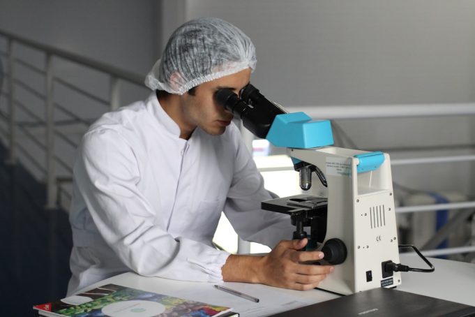 Abbott Laboratories Acquires Exact Sciences for $21 Billion in Cancer Detection Deal A Cologuard test kit box sits on a table, representing the at-home colorectal cancer screening product central to Abbott's acquisition of Exact Sciences.