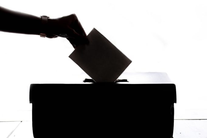 Bangladesh Holds 2026 General Election After Hasina's Ouster, Awami League Banned Voters line up at a polling station in Bangladesh during the 2026 general election, with election officials checking ballots.