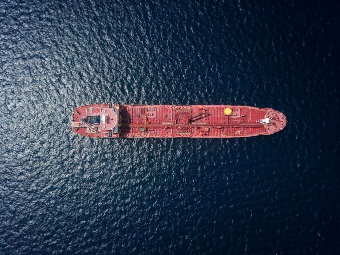 A cargo ship navigates the narrow Bab-el-Mandeb Strait between the Horn of Africa and the Arabian Peninsula.