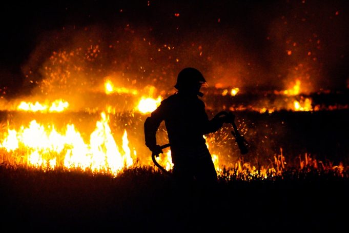 Campbell County Faces Dual Tragedy After Fatal Plane Crash Sparks Wildfire Smoldering sagebrush and grassland north of Gillette under a smoke-filled sky after a fatal plane crash sparked a wildfire.