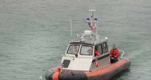 Coast Guard Recovers 4 Survivors in Florida Inlet Capsizing A Coast Guard rescue boat navigates the turbulent waters of the St. Lucie Inlet near Hutchinson Island.