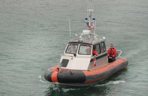 Coast Guard Recovers 4 Survivors in Florida Inlet Capsizing A Coast Guard rescue boat navigates the turbulent waters of the St. Lucie Inlet near Hutchinson Island.