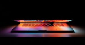 DeepMind FunSearch AI Makes Original Math Discovery A computer screen displays code generated by DeepMind's FunSearch AI, with mathematical formulas and graphs in the background.