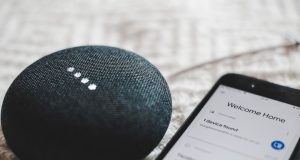 Amazon Fuses Nova, Claude Models in Alexa+ Overhaul Amazon Echo speaker glowing blue on a table as Alexa+ processes a voice command using Nova and Claude AI models.