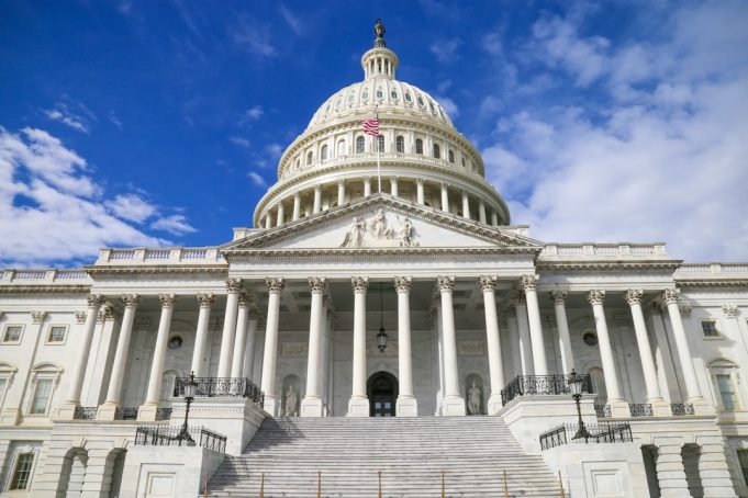 Shmyhal Warns Stalled U.S. Aid May Lead to Broader War Beyond Ukraine Ukrainian Prime Minister Denys Shmyhal speaks at a podium, warning of wider war if US Congress fails to approve aid package.