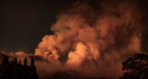 Corfu Wildfires Force Chaotic Boat Evacuations Overcrowded rescue boats packed with evacuees pull away from a burning Corfu shoreline as flames consume the island.