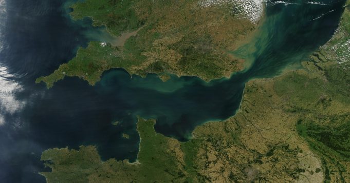 Migrants die, dozens rescued in English Channel crossing attempt tragedy Rescue workers assist migrants on a boat in the English Channel near the coast.