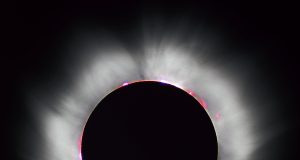 Partial Solar Eclipse Obscures 85% of Sun Over Antarctica Astronomers in parkas watch the Moon bite into the Sun's disk above Antarctic ice, with cameras and telescopes trained skyward.