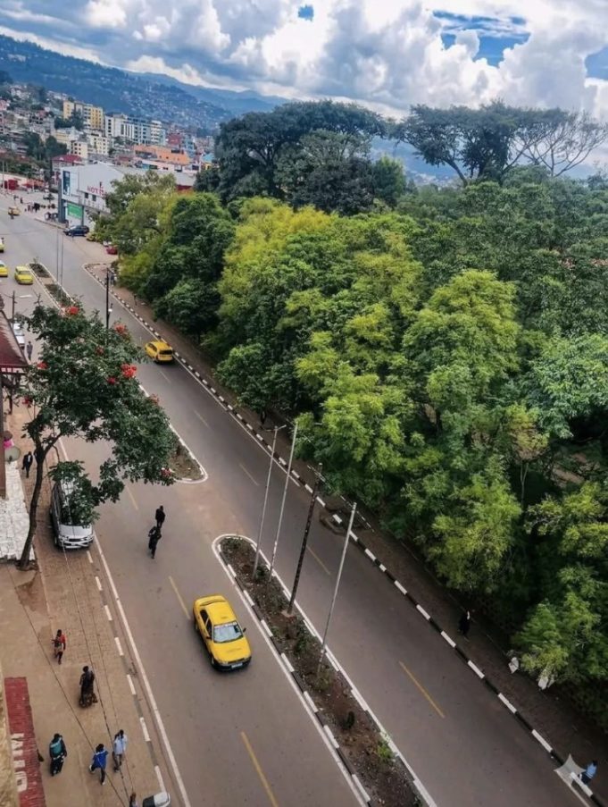 Fire in Bukavu, Congo, Leaves Fourteen People Dead Overnight Firefighters battling a blaze in a residential area of Bukavu, with smoke rising over Lake Kivu in the background.