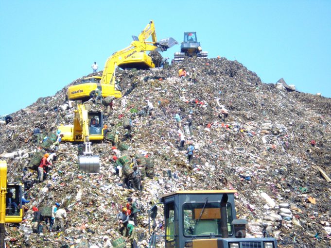 Indonesian Landfill Collapse Kills Four, Traps Several Others Amid Rainfall Rescue teams dig through garbage after a section of the Bantar Gebang landfill gave way during torrential rain.
