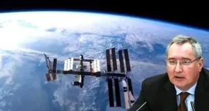 Russia Warns Sanctions May End ISS Cooperation Roscosmos director Dmitry Rogozin speaking at a press conference about the International Space Station's uncertain future due to sanctions.