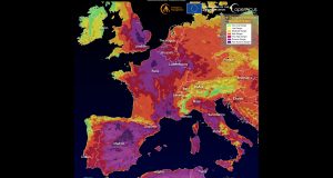 A cracked, dry landscape under a blazing sun, illustrating the severe drought from the 2022 European heatwaves.
