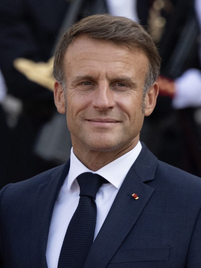 Emmanuel Macron French President Emmanuel Macron speaks at a podium as the McKinsey scandal unfolds over government consulting ties.