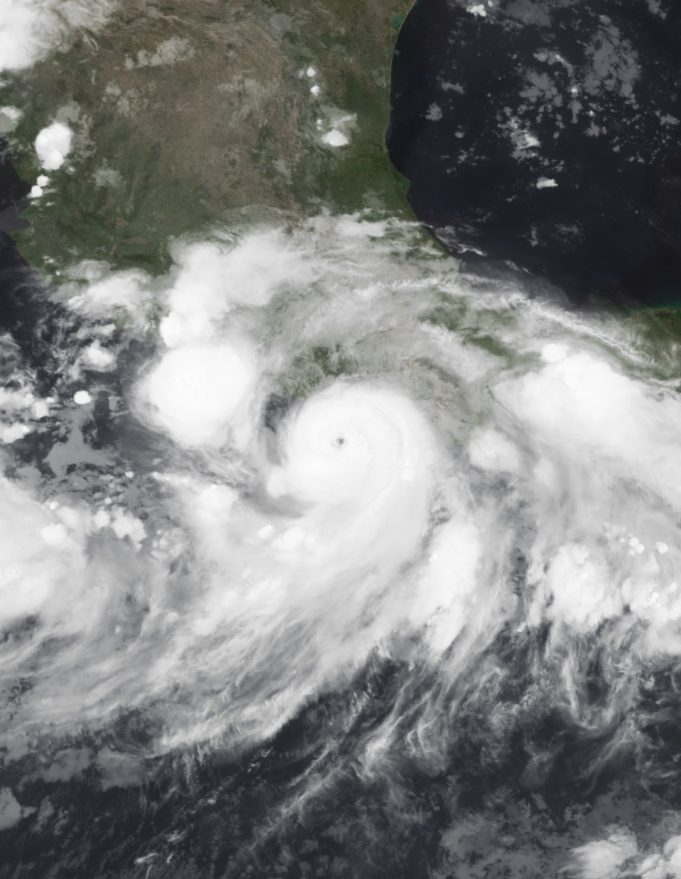 Hurricane John Satellite image of Hurricane John approaching the coast of southern Mexico with a well-defined eye and spiral bands of clouds.