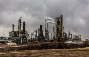 Malaysia Sanitizer Makers Hit by Ethanol Shortage Factory worker in protective gear inspects empty ethanol storage tanks at a Malaysian chemical processing plant.