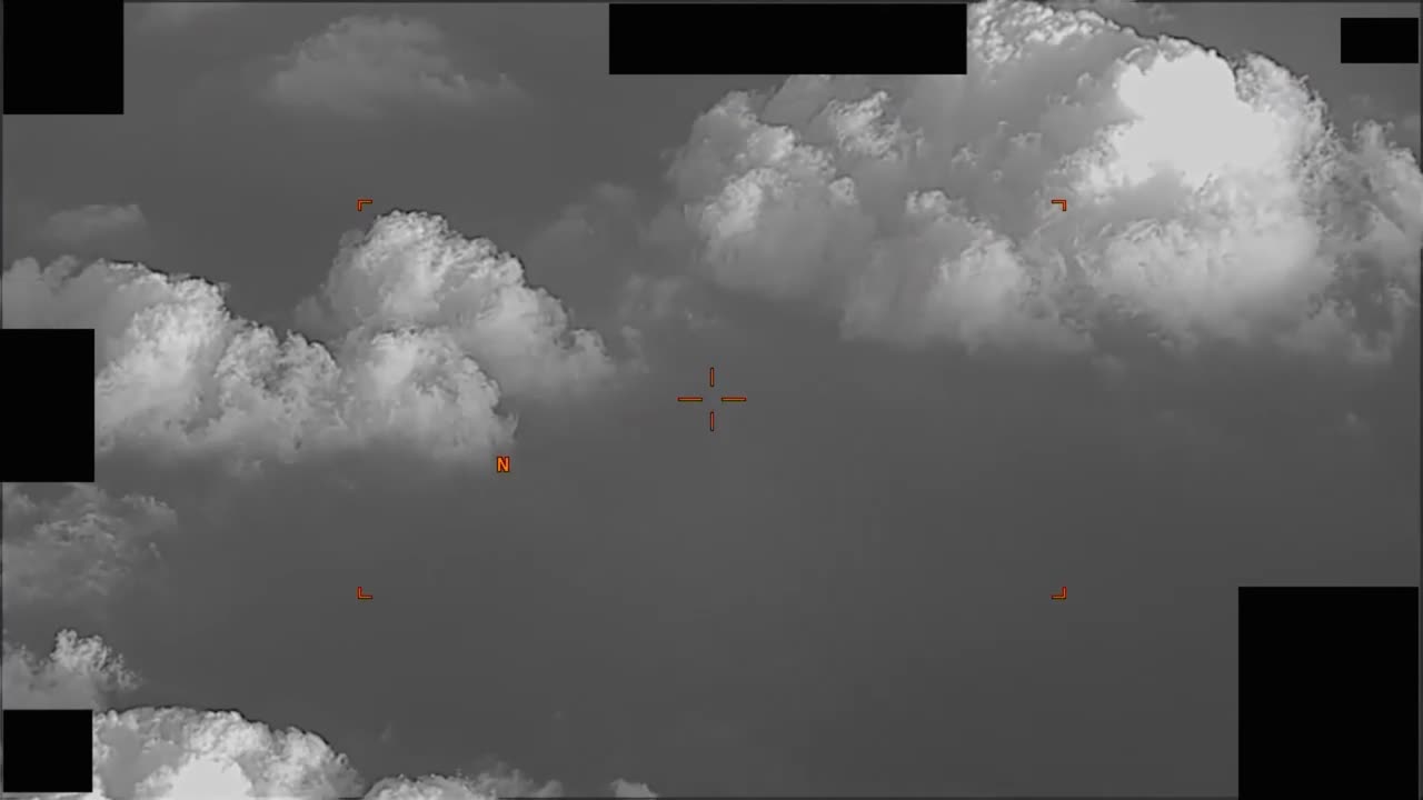 Pentagon Declassifies 2018 Spherical UAP Over Clouds Pentagon Declassifies 2018 Spherical UAP Over Clouds