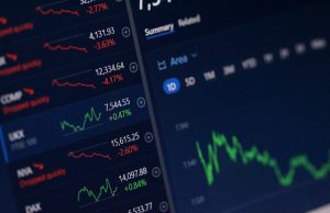 Ringgit Hits 3-Month High as Foreign Funds Return Malaysian ringgit banknotes and US dollar bills arranged on a financial chart showing an upward trend line.