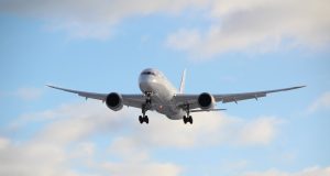 Thai Airways President, Airport Chief Resign Amid Crisis Thai Airways aircraft parked on a tarmac with empty airport terminals in the background during the aviation crisis.