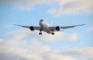 Thai Airways President, Airport Chief Resign Amid Crisis Thai Airways aircraft parked on a tarmac with empty airport terminals in the background during the aviation crisis.