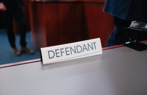 Trump Pleads Not Guilty to 34 Felony Counts Donald Trump stands in a Manhattan courtroom with his attorney, facing a judge during his arraignment on 34 felony counts.