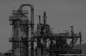 Brunei Fund Posts $1.2B Loss in One-Page Filing Close-up of a single-page financial document stamped confidential, oil derricks blurred in background