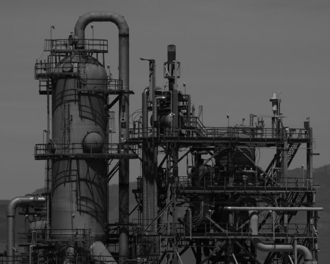 Brunei Investment Agency Reports $1.2 Billion Loss in Sparse Filing Close-up of a single-page financial document stamped confidential, oil derricks blurred in background