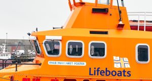 45 Migrants Rescued in Channel, UK Asylum System Strained Rescue boats pull migrants from the cold English Channel waters near a coast guard vessel on a December day.