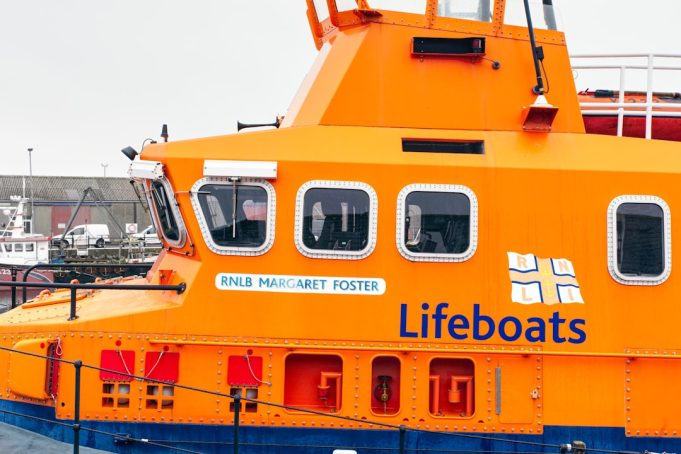 Rescue of 45 Migrants in Channel Adds Strain to UK Asylum System Rescue boats pull migrants from the cold English Channel waters near a coast guard vessel on a December day.