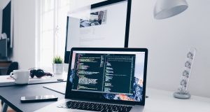 Meta Open-Sources Code Llama Coding AI Model Meta's Code Llama coding AI model displayed on a laptop screen with developer code in the background.