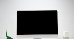 OpenAI Launches Operator Agent for Web Tasks OpenAI Operator agent interface displays automated web browsing and form-filling tasks on a laptop screen.
